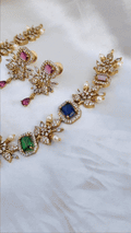 Pallav South Indian Multicolour AD Stone Jewelry Set - South Indian Gold-Plated Necklace and Earrings